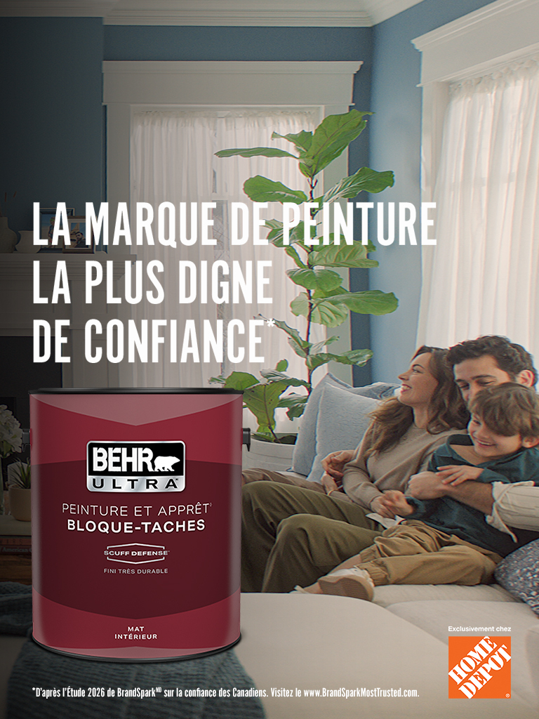 Mobile-sized image of a couple looking at their freshly painted wall