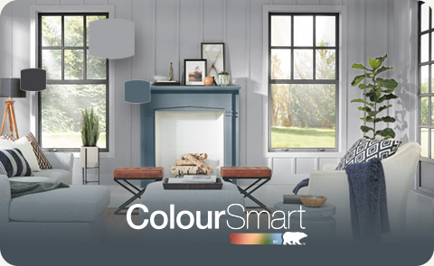 Painted living room with the ColourSmart by BEHR logo in the foreground
