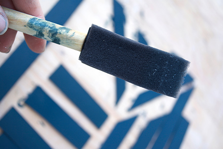 Foam brush used to paint balsa strips