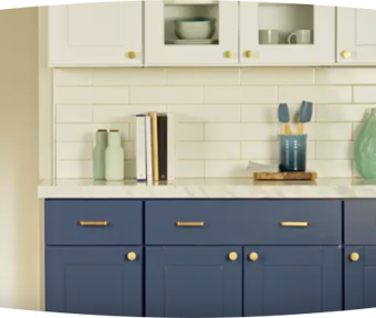 Blue kitchen cabinets with white backsplash