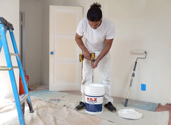 stirring Kilz primer