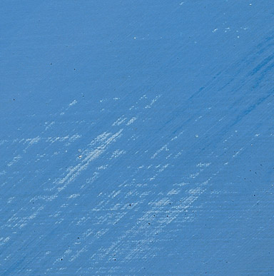Close up image of a surface that has some brush marks on it.