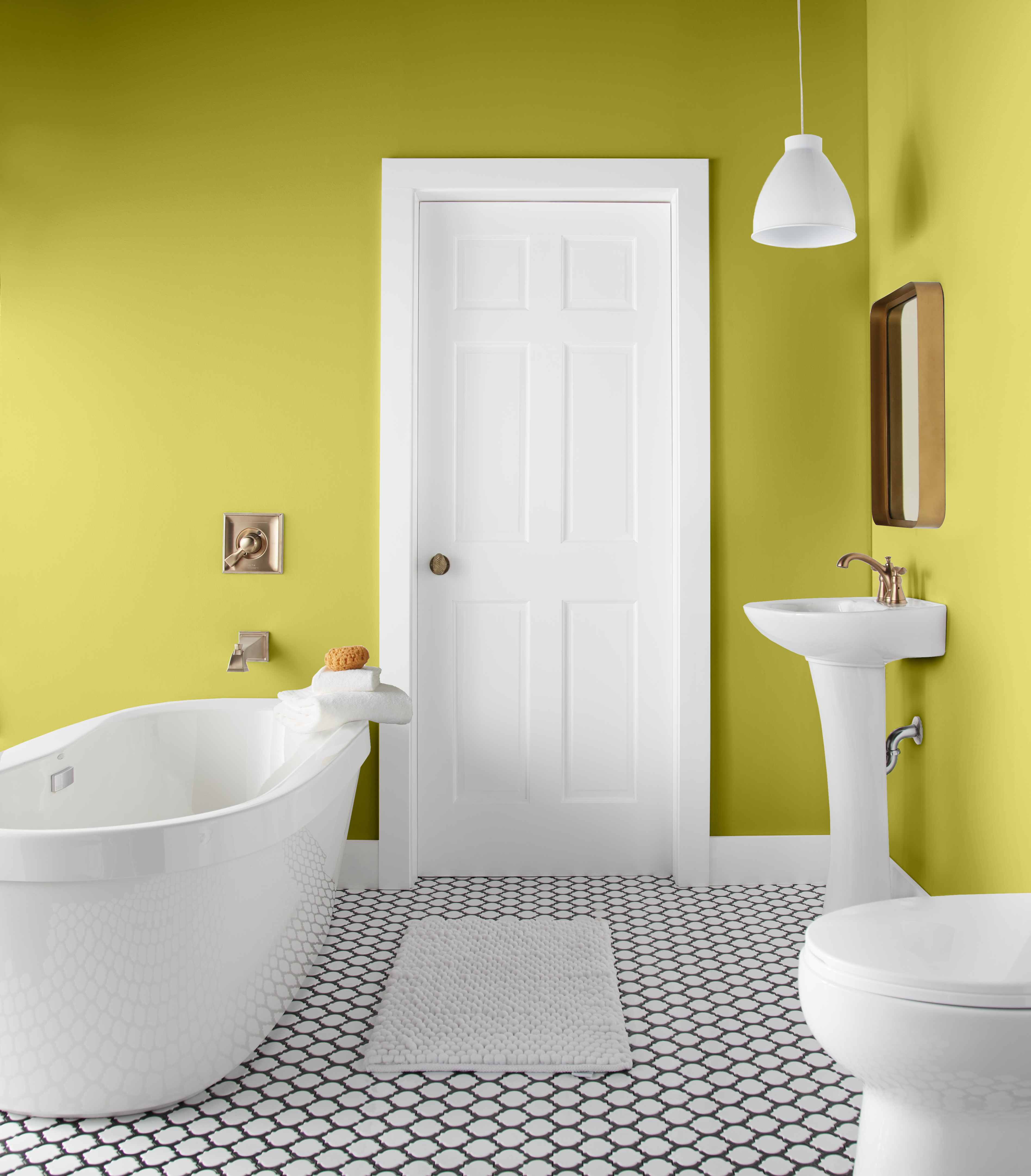 Cette image montre une salle de bain dont les murs sont peints en vert lime.